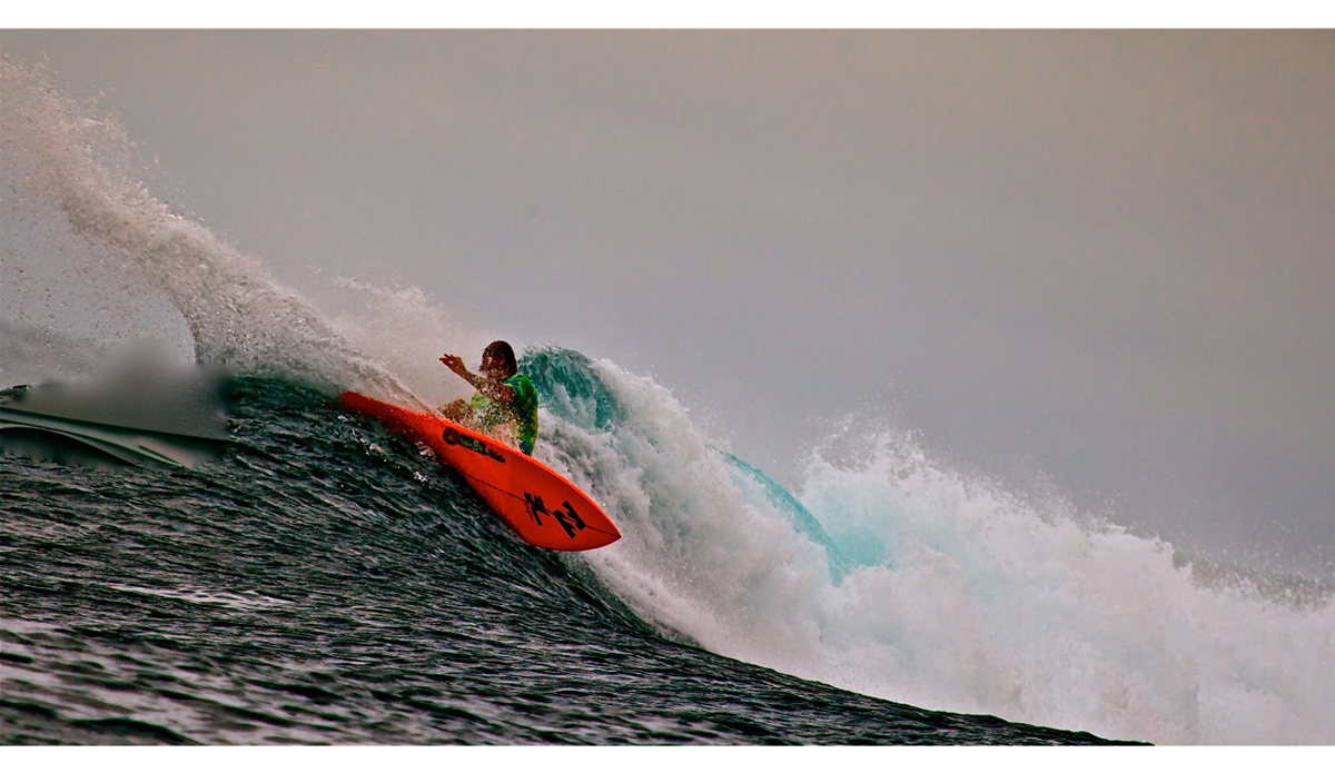 This photo was on our first day arriving to the island. It\'s at a spot called Bank Vaults, a very fun right hander that gets really good on the right swell
and has an amazing tube. At the right size, it was a fun warm up session. Photo: <a href=\"http://www.mentawaiislands.com/\">Kandui Resort</a>