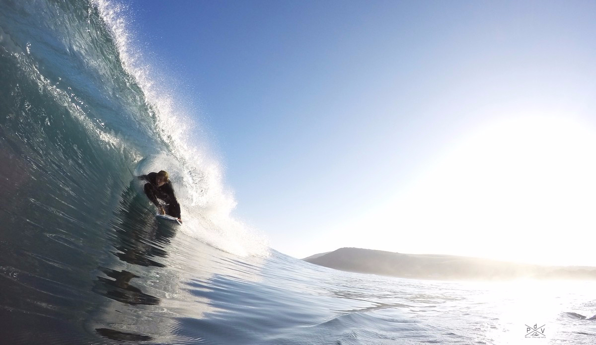 Simon slides through a backhand tube. Photo: Pierre de Villiers