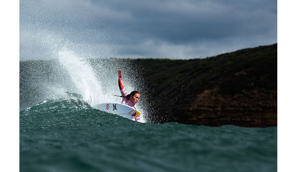 Carissa Moore winning the final at Bells this year. It feels great to capture these moments in competition; this was a pretty slow heat with not a lot of waves ridden so to get her illuminated against the cliff like this was kind of special. Photo: <a href=\"http://edsloanephoto.com/\">Ed Sloane</a>