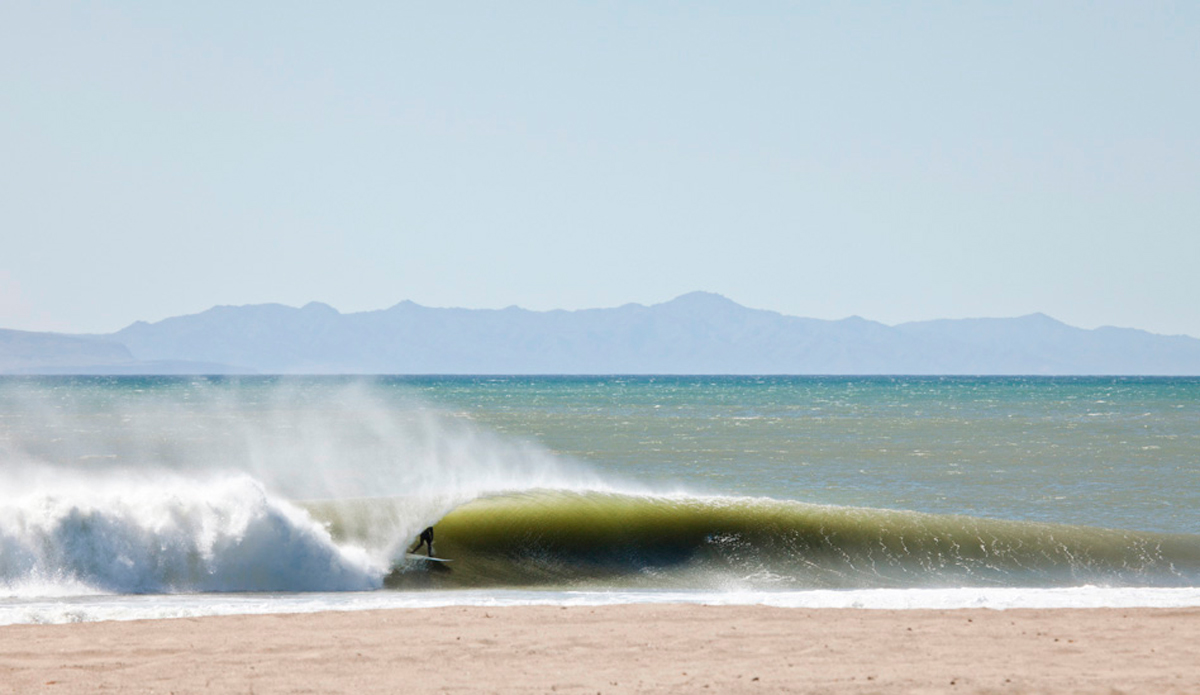 Matt McCabe standing tall in a perfect California tube. Photo: <a href=\"http://paulgreenephoto.com/\" target=_blank>Paul Greene</a> 