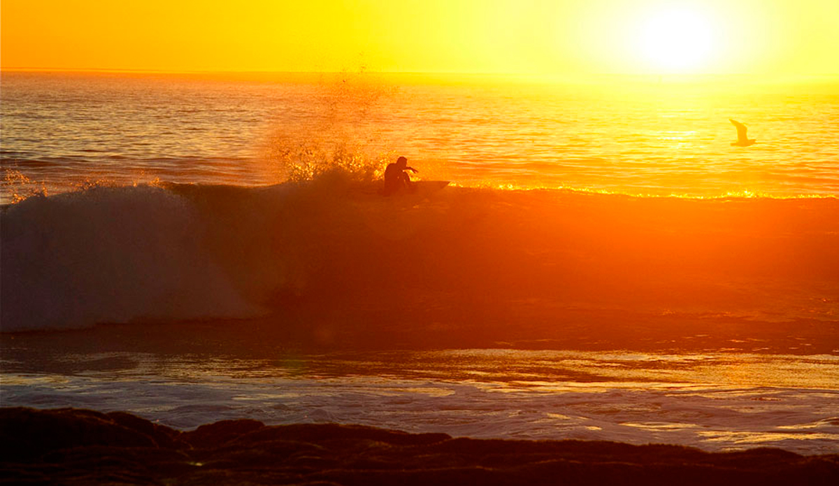 Tyler Fox isn\'t just about huge waves. He\'s also about doing massive functional floaters during golden hour. He stuck this. Photo: Robb Wilson