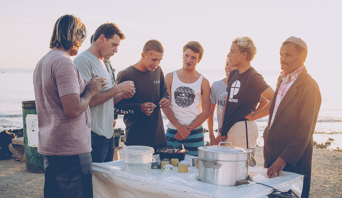 Surf Team Belgium trying out some of the local cuisine: boiled snails. 