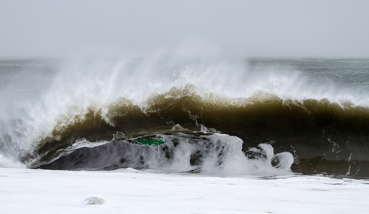 Andrew Gesler\'s board taking a trip over the falls on one of the slab-iest waves in New Jersey.