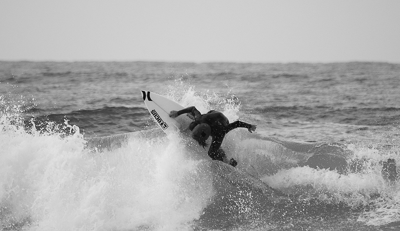 Surfing at Reshon Lazion west coast beach.