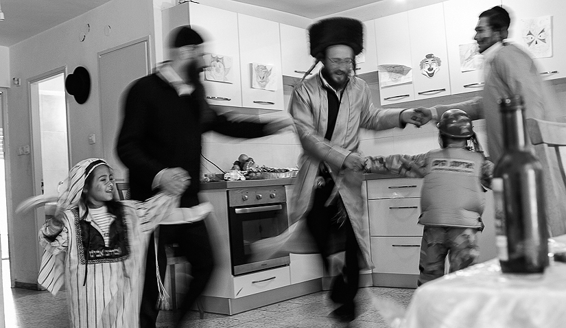 Celebrating \"Purim\" holiday at Meir\'s house in Jerusalem.