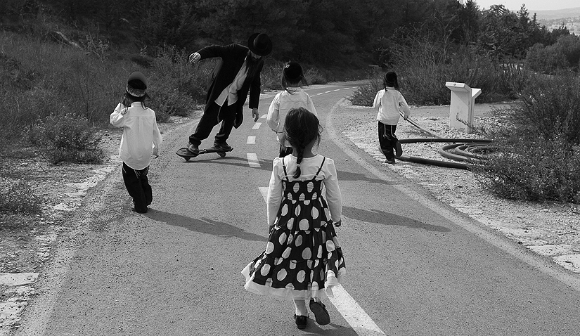 Playing with his children. As a child, Meir was one of the best skateboarders in his city.