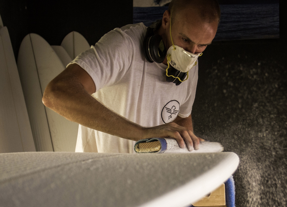 Behind-the-scenes look into the working people of the surfing world. Here\'s Drew Sparrow
shaping boards for North Shore locals and big-waves surfers from all over the world.  Photo: <a href=\"http://www.shigephoto.co/\">Gavin Shige</a>