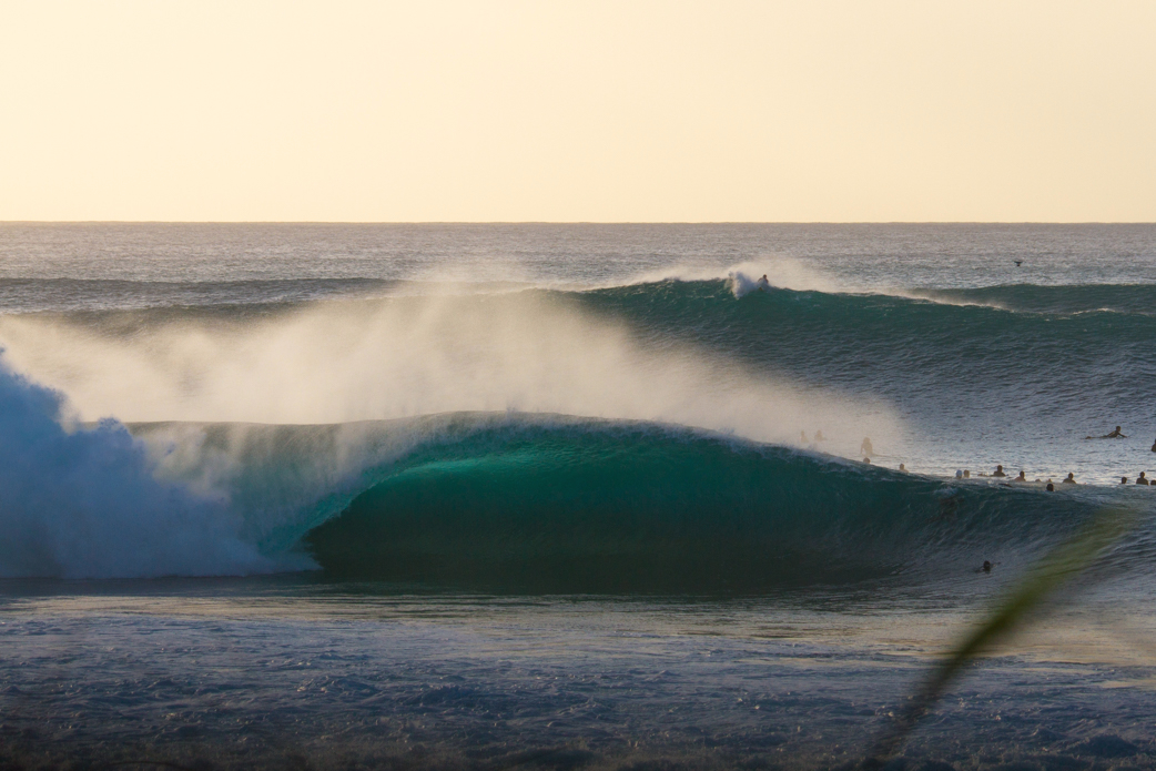 Mid-December Pipeline was perfect and a rare empty going through the crowded lineup. Photo: <a href=\"http://www.shigephoto.co/\">Gavin Shige</a>