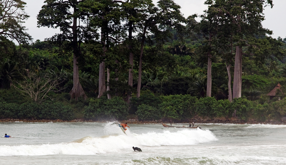 It\'s hard to believe the local fishing canoes or pirogues are carved out of those massive trees in the background. It\'s even harder to believe that\'s how they have been done by hand for hundreds of years. Photo: <a href=\"http://www.gregewingphoto.com/\"> Greg Ewing</a>