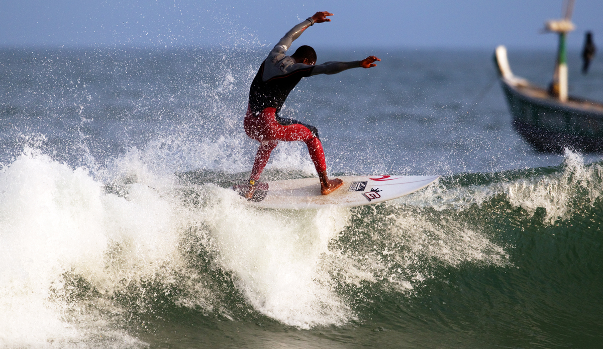 Local surfer Kofi floating the beach break at Busua. Photo: <a href=\"http://www.gregewingphoto.com/\"> Greg Ewing</a>