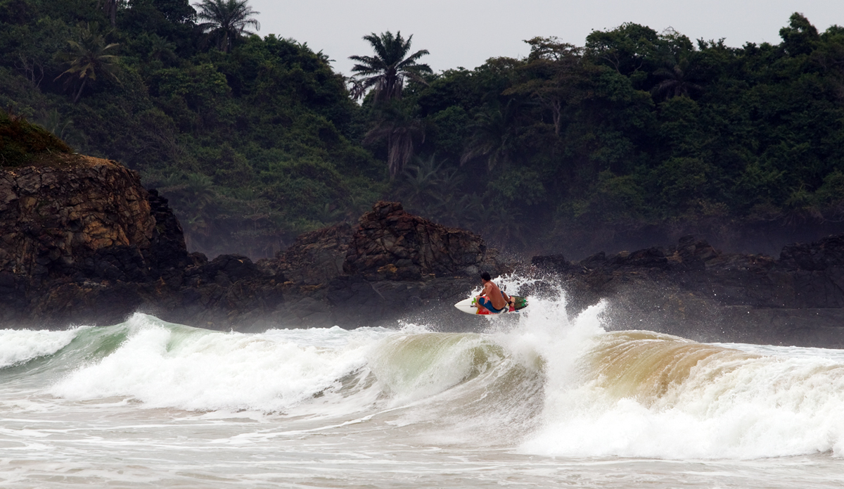 John boosting at an unnamed spot near Cape Three Points. Photo: <a href=\"http://www.gregewingphoto.com/\"> Greg Ewing</a>