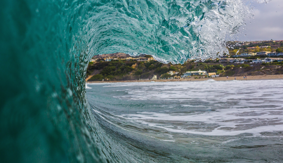 Square. Offshore wind created the texture on this wave.