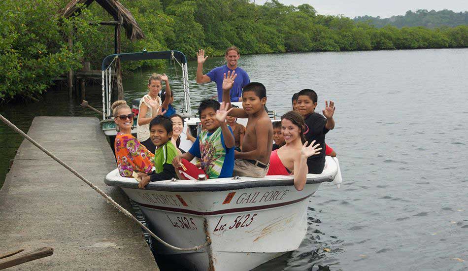 Chocolate tour and class with local kids and non-profit Give & Surf. Photo courtesy of Groundswell Travel