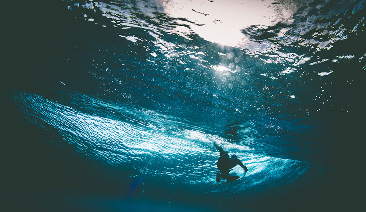 The dark blue of the ocean against the strength of the sun. An unknown slides under another one. Photo: <a href=\"http://haydenoneillphoto.com/\">Hayden O\'Neill</a>