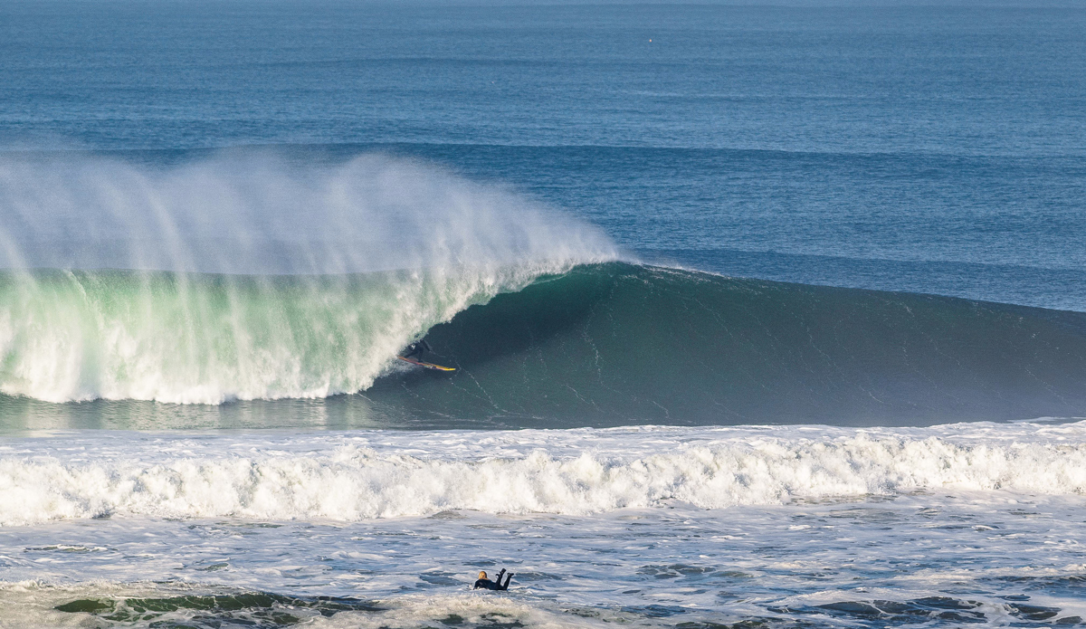 This beach break will humble the best of \'em. On a big day, you might squeak out a rip in five minutes, or take a beating for a half an hour before you make it past the impact zone. On this particular day, it was the latter so it made this wave that much sweeter after about an hour of non-stop paddling. Photo: Ryan Chachi Craig