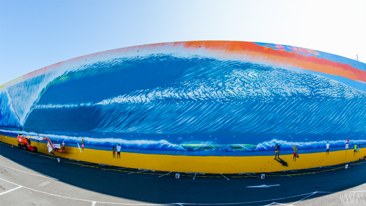 \'The Largest Wave Mural in the World\'. The 14,080-square-foot painting is located at Waiakamilo Rd., in Kalihi, Honolulu. I used 150 gallons of paint, a 65 ft boom lift and a help from a lot of volunteers, friends and family. That mural is the first one of a series of 101 that I\'m planning to paint around the world.  