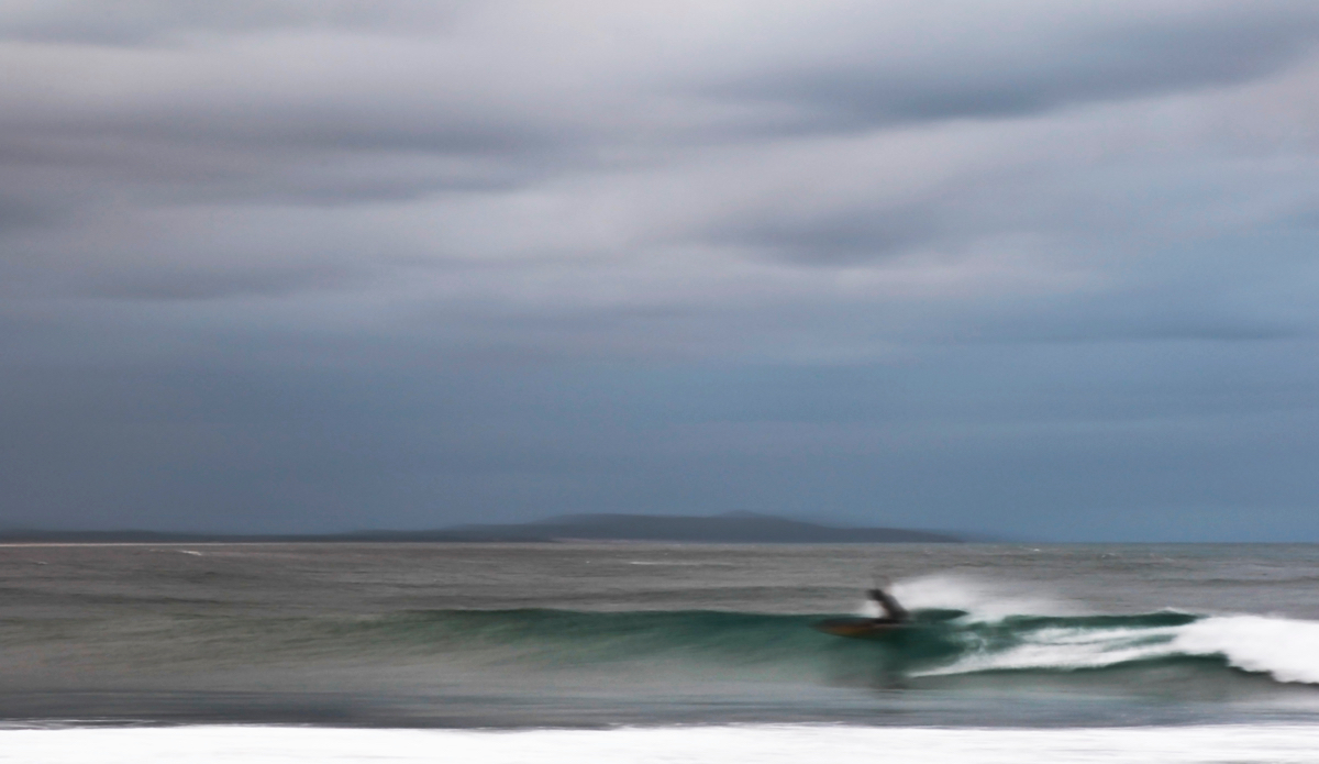 Stylish surfing in the dark. Pretty sure the men in grey suits were lurking. Photo: <a href=\"http://www.instagram.com/hollytreephoto\">@HollyTreePhoto</a>