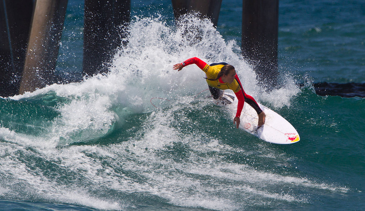 Carissa Moore (HAW) (Pictured), 21, reigning two-time ASP Women’s World Champion and defending Vans US Open of Surfing Champion, continued her successful run at Huntington Beach. Moore claimed a Round 1 win with a pair of modest scores, securing a Round 3 berth in the process.

\"You have half an hour and I was watching the waves and knew there would be some lulls,\" Moore said. \"It was hard to be patient when Leila (Hurst) only needed a five. All of the girls are surfing really well and you have to look at what they\'re doing for inspiration. Sally (Fitzgibbons) is surfing really well and I\'m going to have to do my best if I want a good result here.\"
 Photo: ASP/ Rowland