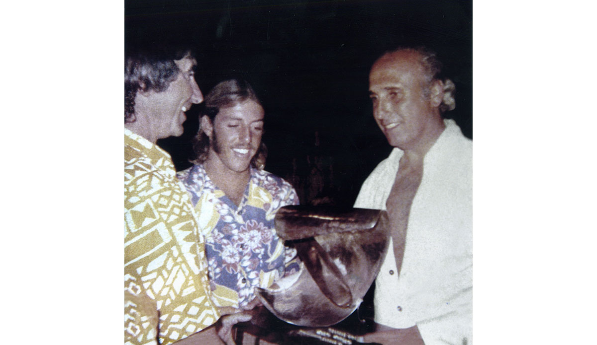 By the time California’s Rolf Arness won the World Surfing Championship at Johanna, Australia, in ‘70 and Hawaii’s Jimmy Blears (pictured with George Downing and ISA founder Eduardo Arena) won in ’72, competitive surfing was on the decline. For numerous reasons, the World Surfing Championship wouldn’t be held again until ‘78. Photo: <a href=\"http://www.isasurf.org/\">ISA Archive</a>