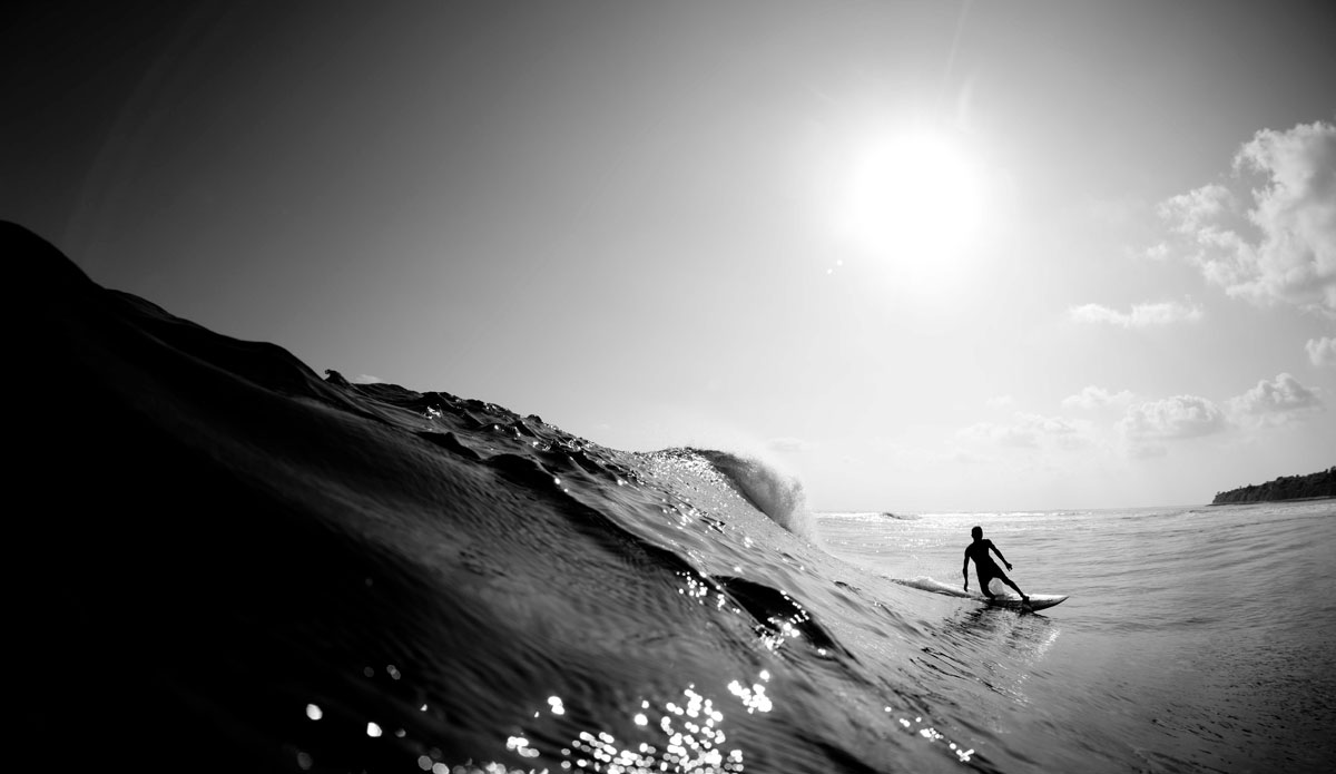 Local surf guide drawing a few simple lines as his guest rest up. Photo: <a href=\"http://www.jackdekortphoto.com.au/\">Jack Dekort</a>