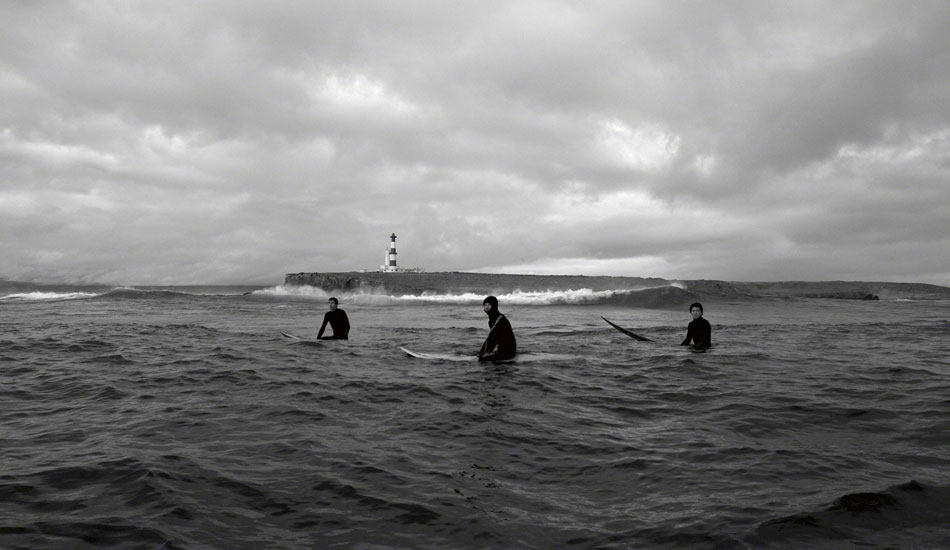 Rusty Long, Grant \"Twiggy\" Baker, Greg Long. Killers, Todos Santos, Baja, Feb 2007. So much of the surfing experience is waiting, waxing, driving, preparing, packing and paddling. A microscopic percentage of the experience is spent riding waves. That percentage gets exponentially smaller for big wave surfers. Photo: <a href=\"http://www.photomurray.com/\" target=_blank>Jason Murray</a>.