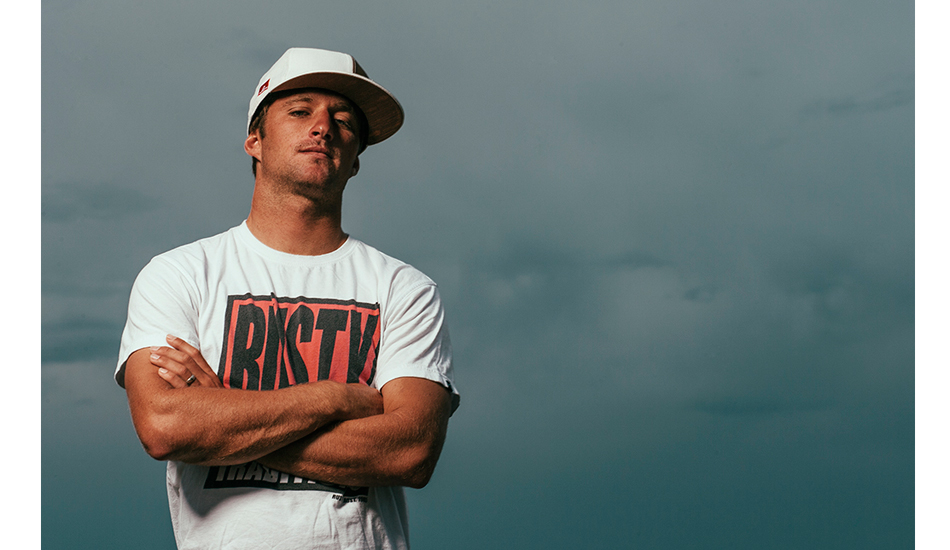 A portrait of Josh Kerr for Transworld Surf. We shot this in front of Kirra on a stormy day. Photo: <a href=\"http://www.reposarphoto.com\">Jason Reposar</a>