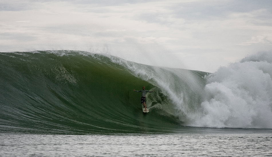 Jamie O\'Brien doing what he does best. Photo: <a href=\"http://www.reposarphoto.com\">Jason Reposar</a>