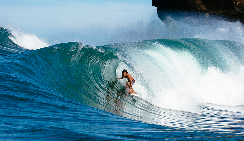 Lee Wilson nicely slotted in a Pacitan barrel. Photo: <a href=\"http://www.reposarphoto.com\">Jason Reposar</a>