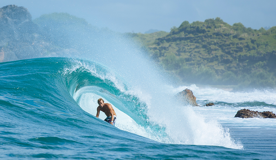 Peeking into the barrel from the channel at Pacitan, Java. Josh Kerr. Photo: <a href=\"http://www.reposarphoto.com\">Jason Reposar</a>