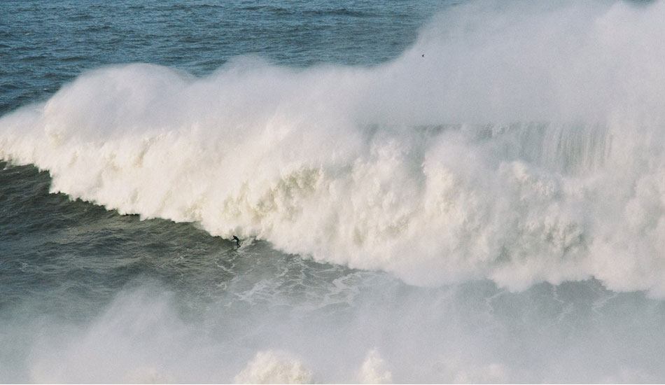 Andrew Cotton about to get swallowed alive. Photo: <a href= \"http://joaobracourt.com/\" target=_blank>Joao Bracourt.</a>