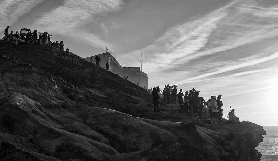 The waves didn\'t really turn on Sunday despite the thousands of visitors. Photo: <a href= \"http://joaobracourt.com/\" target=_blank>Joao Bracourt.</a>