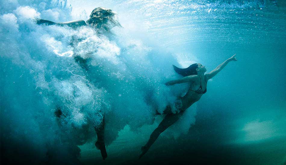 Shark sightings and heavy wipeouts didn\'t stop these ladies from putting their bodies on the line for the sake of art. Photo: <a href=\"http://johnbarton.net.au/\">John Barton</a> 