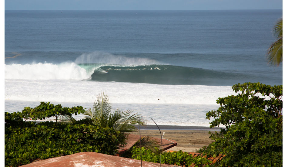 What you may not have seen was Greg Long\'s next deep beast. He didn\'t make the barrel, but he did as good as anyone could have. After this set, the conditions got funky again. Most of us were over surfing it for fear of injury. Photo: <a href=\"http://www.hungrywalrus.com/\" target=_blank>John Maher</a>