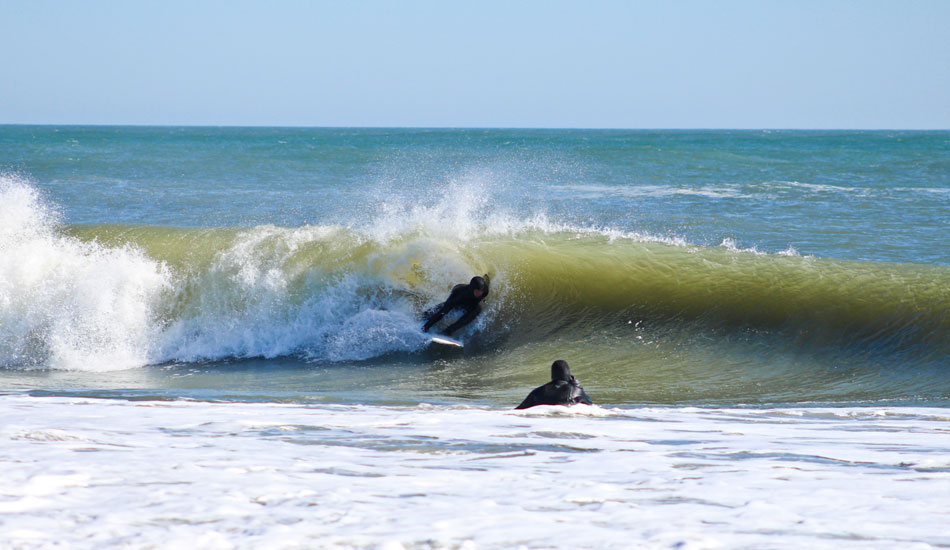 It doesn\'t have to be overhead for Hatteras to produce great barrels, as this unidentified ripper demonstrates. Photo: John Streit.