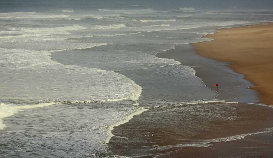 Nazaré:    Lonely Soul Surfer. Photo: Jose Pinto