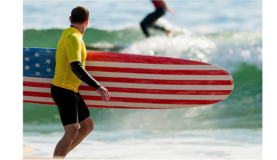 Manasquan, New Jersey. Matt Lewis with the flag board that was lost to Hurricane Sandy just six weeks later. Photo: <a href=\"http://joanneosh.zenfolio.com/\" target=\"_blank\">Joanne O\'Shaughnessy</a>