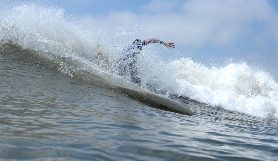 Unknown surfer putting it on a rail last fall. Photo: <a href=\"http://follyhood.blogspot.com\">Justin Morris</a>