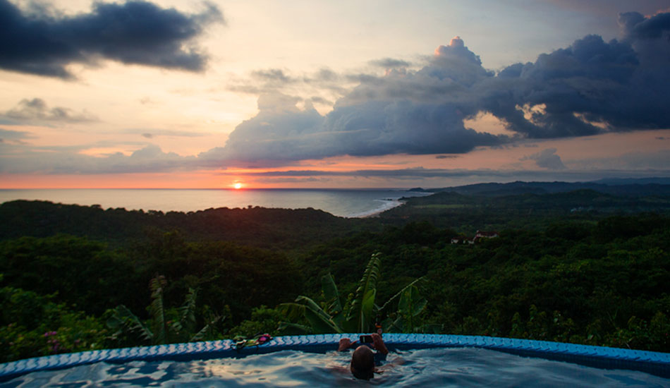 The view from Venatana A Las Ola\'s pool. No better way to finish a day than a sunset and cold Tona.