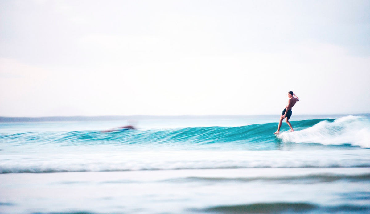 Cyclone Marcia left-overs keeping loggers happy at Noosa. As night time was approaching, surfers still slid down the line. I slowed the shutter right down and captured this relaxed surfer cruising his way along first point, scoring the remaining lumps of Marcia. Photo: <a href=\"http://www.kanebrownphoto.com/#1\">Kane Brown</a>