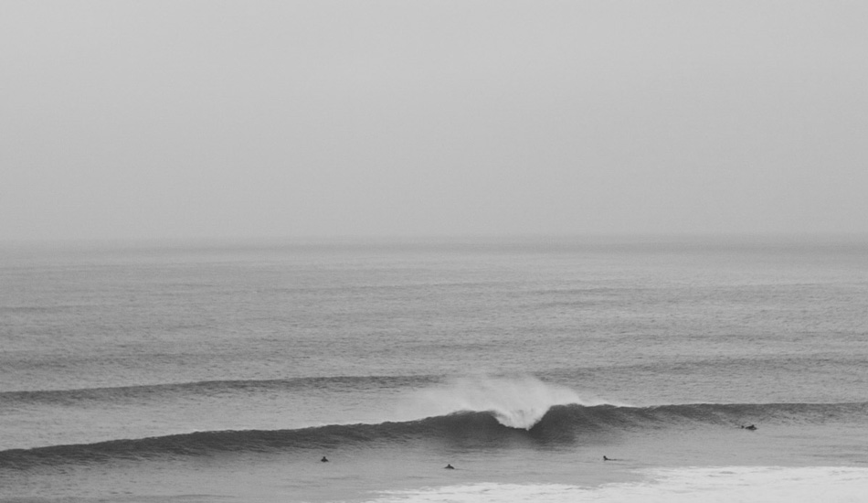 Watergate Bay throwing up a winter a-frame. Photo: <a href=\"http://www.mackie-studio.com\">Karl Mackie</a>