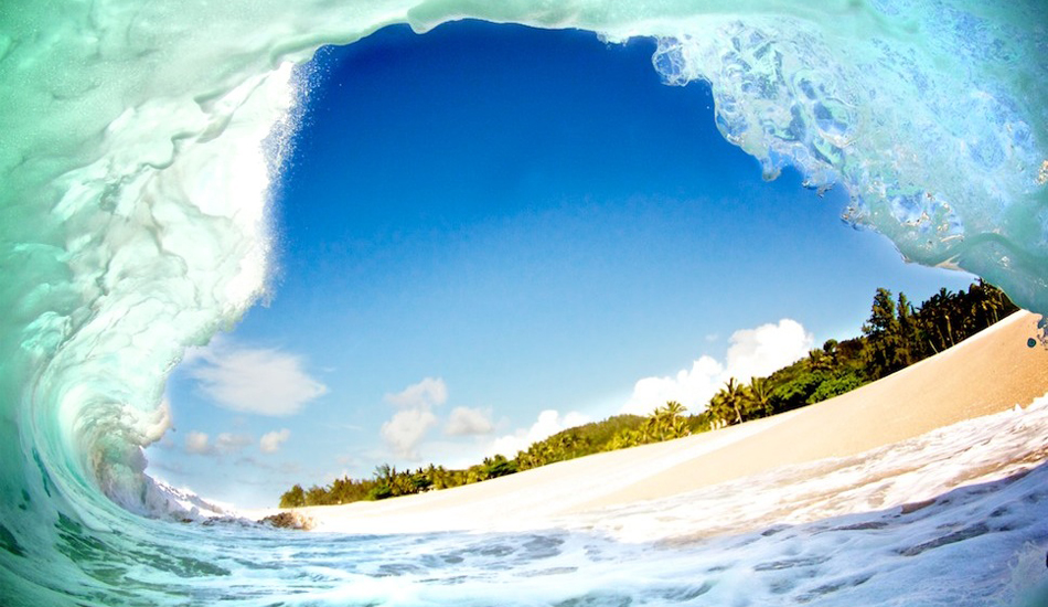 Keiki Beach (North Shore) about 1 month ago. Biggest shore break I ever shot. Double overhead (no lie) shorebreaks. 12-15 foot monsters, people were watching me like I was on crack for being out there. Unfortunately this wave doesn\'t show how big it was, I later got slammed and ruined my camera (again) in the big surf. Image: <a href=\"http://gokenji.com/port/\" target=\"_blank\">Croman</a>