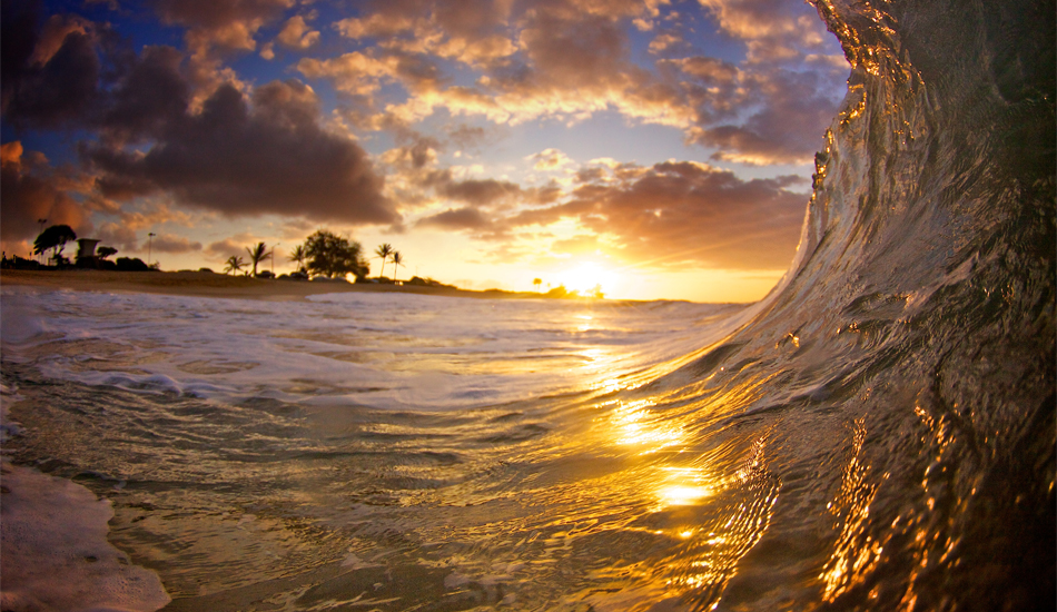 A perfect morning sunrise in the water. The colors were so saturated and vibrant.  Image: <a href=\"http://gokenji.com/port/\" target=\"_blank\">Croman</a> 