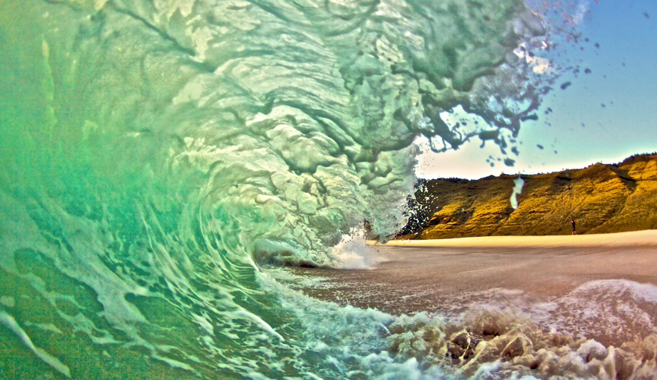 Yokohama green monster shorebreak. The next day I came back because the waves were epic, got so excited I didn\'t tighten my housing and leaked. Ruined my camera and lens, over $3,000 in damages not covered.  Image: <a href=\"http://gokenji.com/port/\" target=\"_blank\">Croman</a>