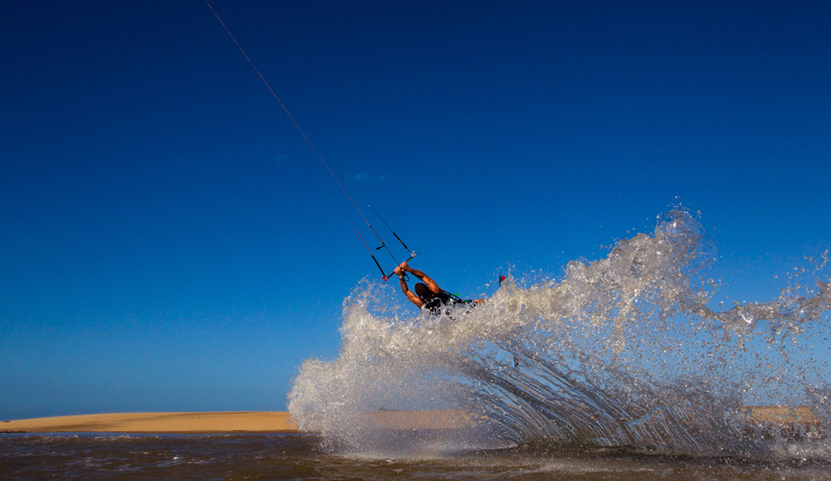 Daniel Anderson launches into an aerial maneuver whilst kitesurfing Alva beach in far North Queensland, Australia. Photo: <a href=\"https://instagram.com/krystlejwright/\">Krystle Wright</a>