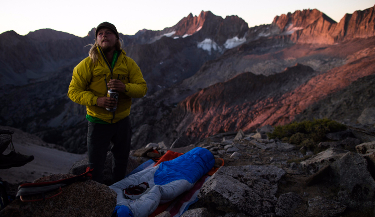 Preston Bruce Alden wakes at first light on top of Temple Crag in The Palisades of the Sierra Mountains in California USA during a highline exploratory expedition. Photo: <a href=\"https://instagram.com/krystlejwright/\">Krystle Wright</a>