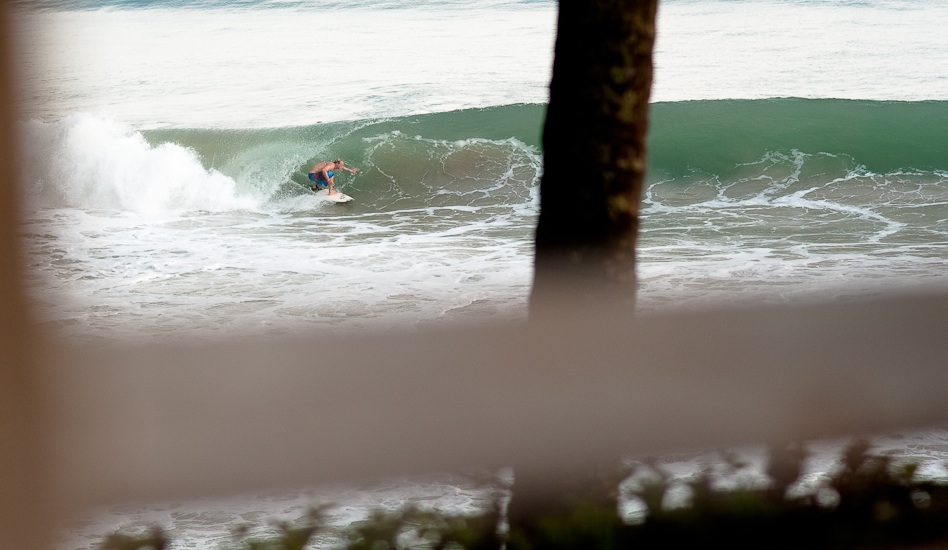 German local surfer Yoyo checking out this new found spot in Kerala. Photo:  <a href=\"http://www.larsjacobsen.com/\" target=_blank>Lars Jacobsen</a>.