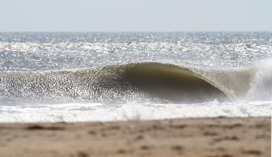 Oregon Inlet Beach Break. Leslie dishes out some perfection along the Outer Banks. Image: McCarthy