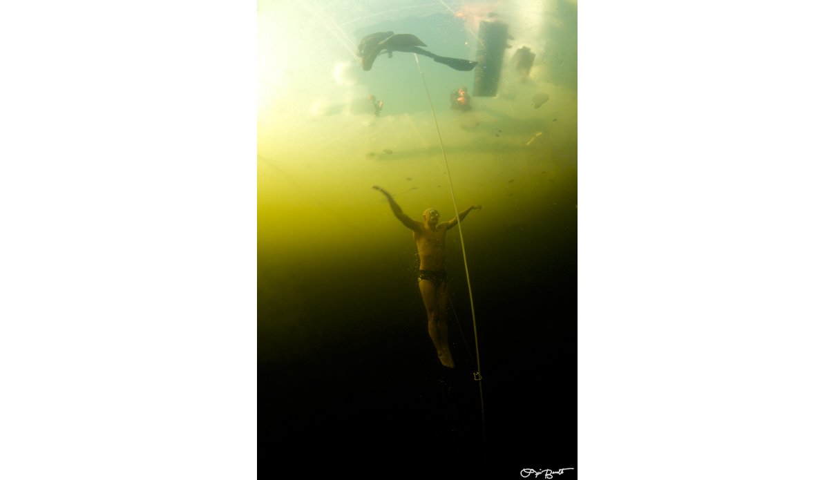 World Record under ice holder Stig Severinsen doing a no-ﬁns dive with a 
Speedo on. Photo: <a href=\"http://liabarrettphotography.com/\" target=_blank>Lia Barrett</a>