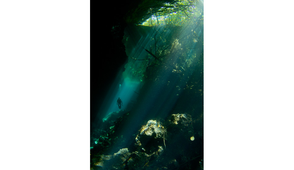 Local activist Nancy DeRosa at her namesake cenote Ponderosa. Photo: <a href=\"http://liabarrettphotography.com/\" target=_blank>Lia Barrett</a>