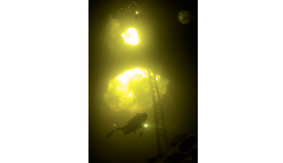 Ascending from a dive at the entrance of Calavera Green light cenote. Photo: <a href=\"http://liabarrettphotography.com/\" target=_blank>Lia Barrett</a>